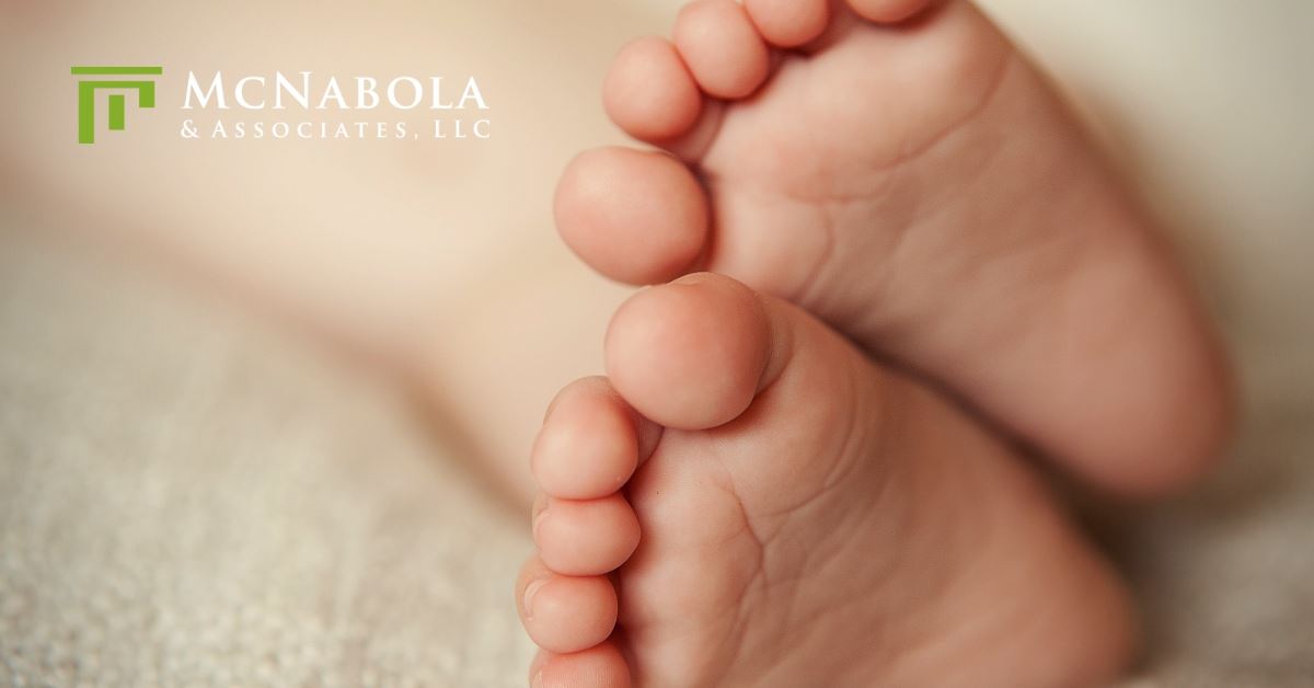 closeup of baby feet on a blanket