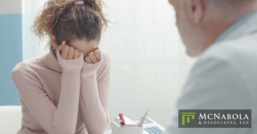 woman talking a doctor